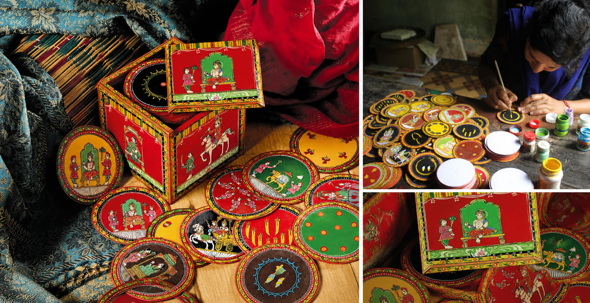 Hand-painted circular Ganjifa cards featuring colorful Hindu deity illustrations and gold detailing