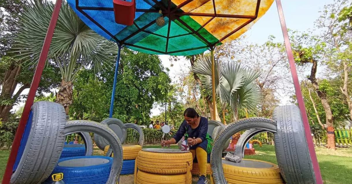 Colorful sculptures made from recycled vehicle parts and scrap metal in Rayagada's waste-to-wonder park