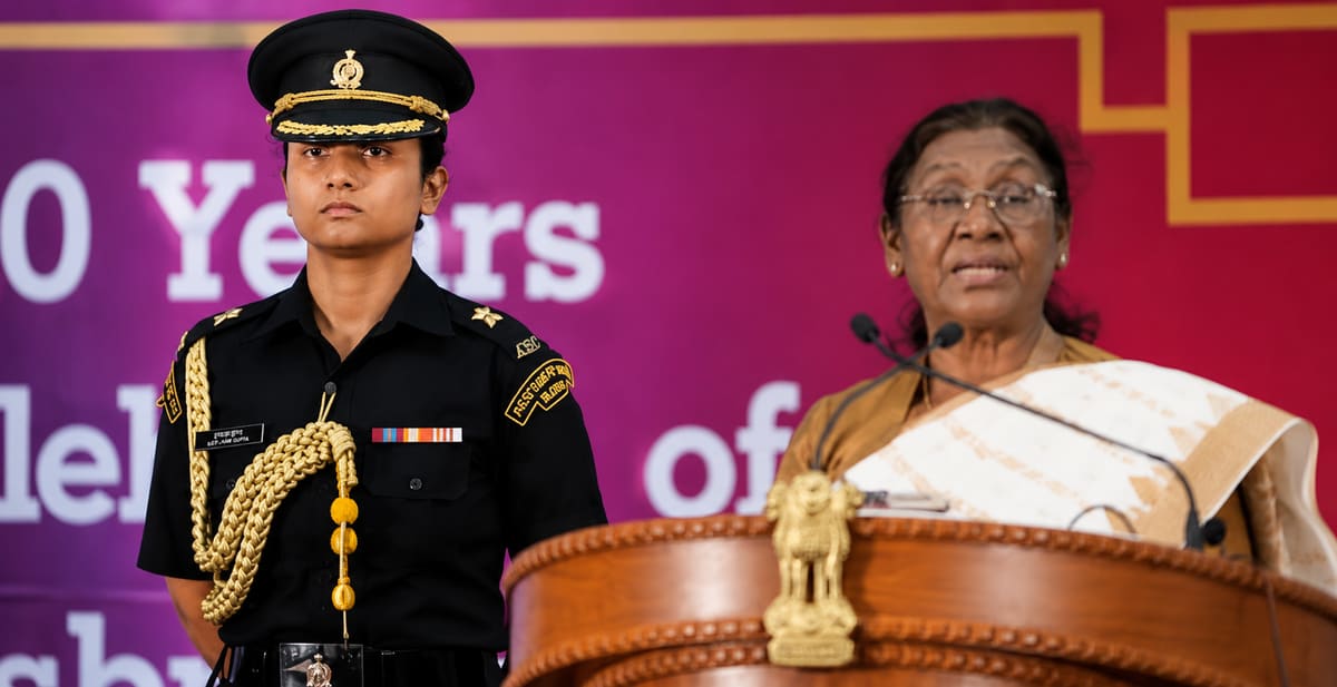 Major Navya Shekhawat in military uniform standing at attention during presidential ceremony
