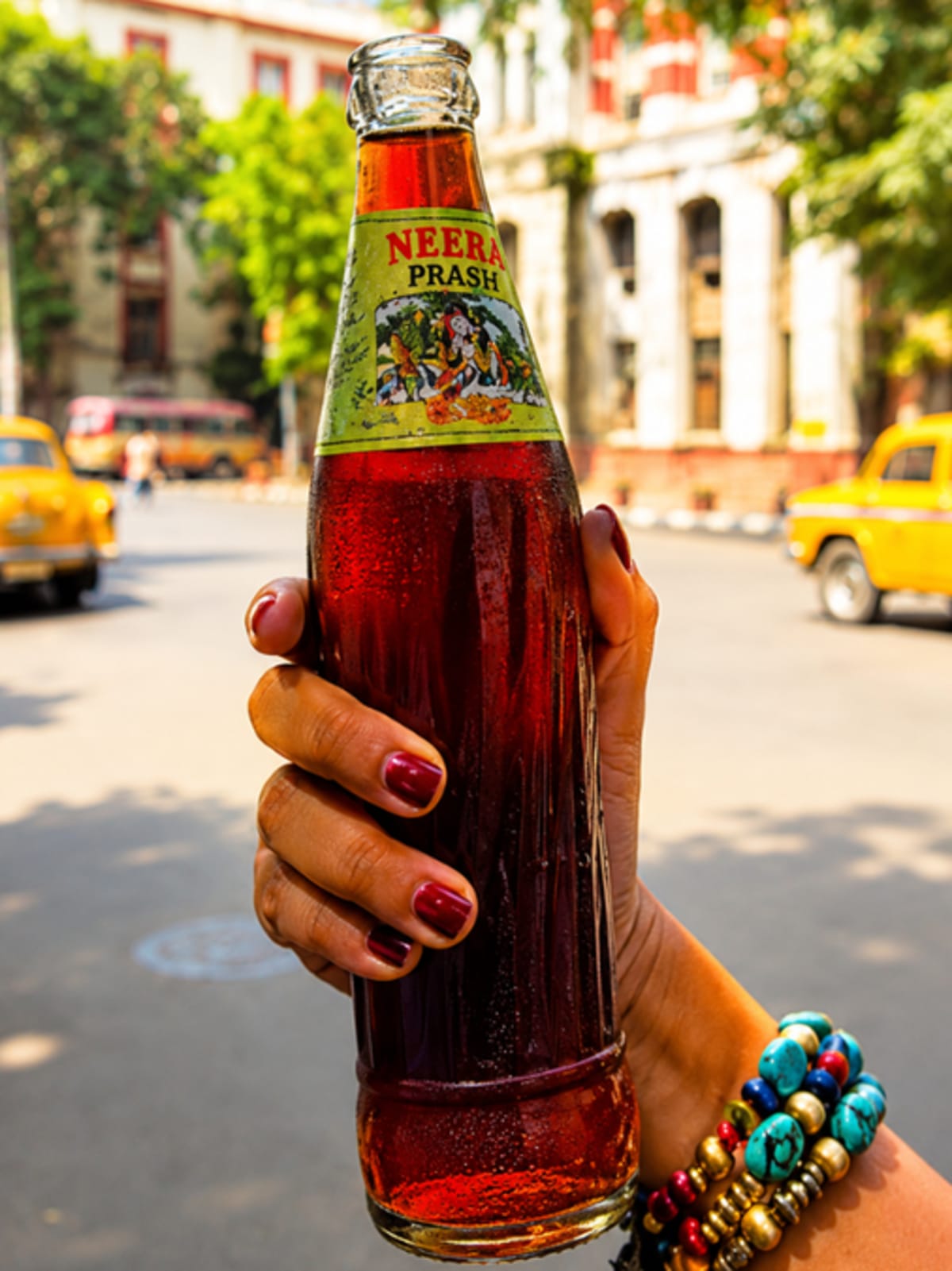 Neera Prash palm sugar drink bottles being sold from traditional van in Kolkata