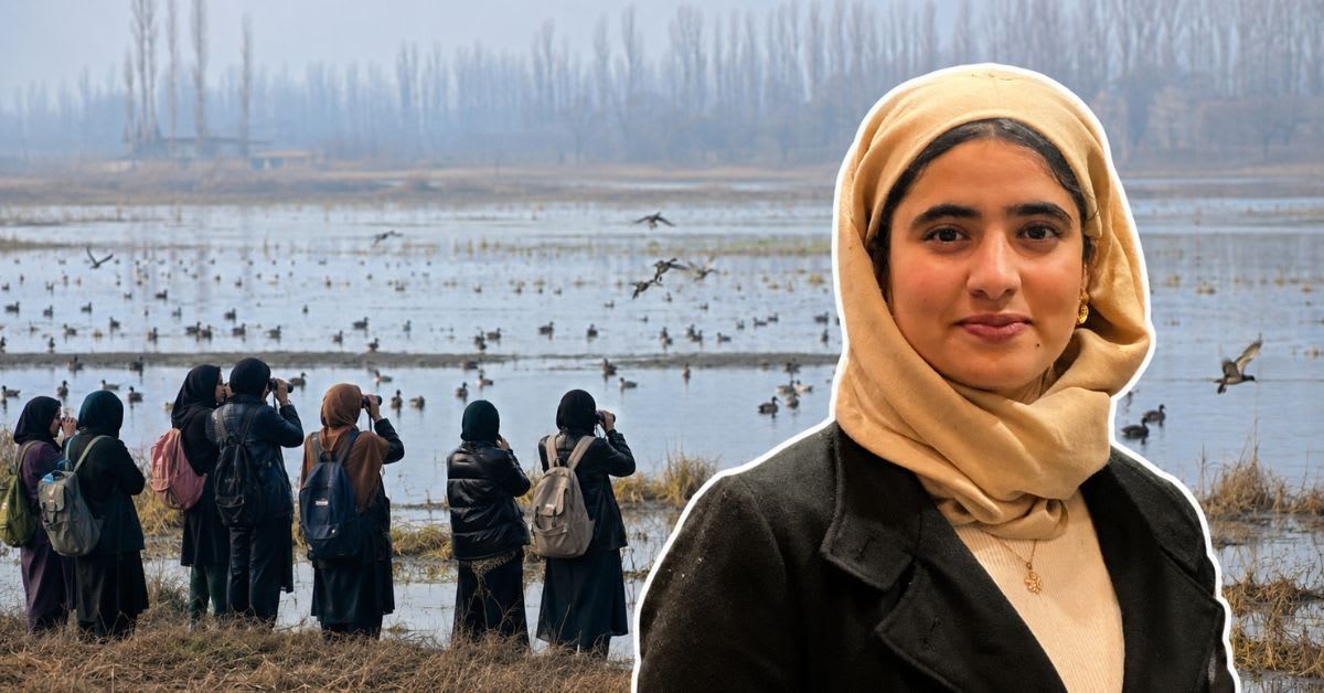 Young women with binoculars and notebooks observing birds at Kashmir wetland reserve