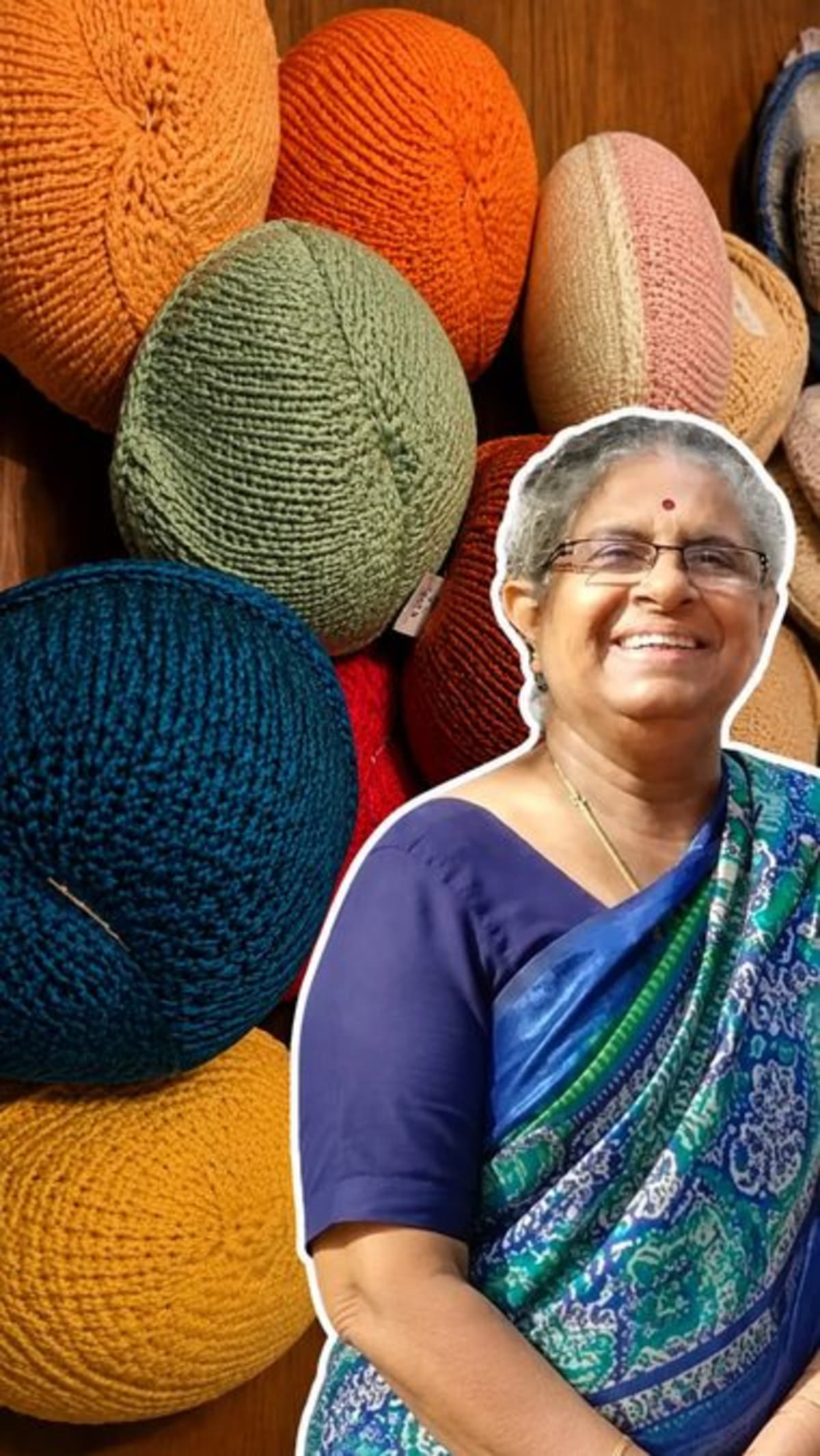 Elderly woman with gray hair smiling while crocheting soft breast prosthesis with cotton yarn