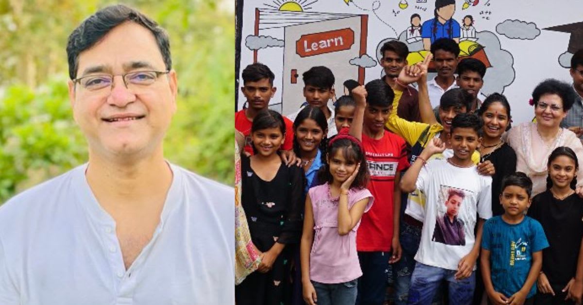Indian police officer Veerendra Mishra working with children from Bedia community in classroom