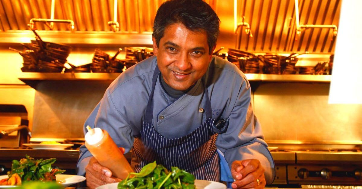 Chef Floyd Cardoz in kitchen preparing refined Indian cuisine dishes with regional ingredients