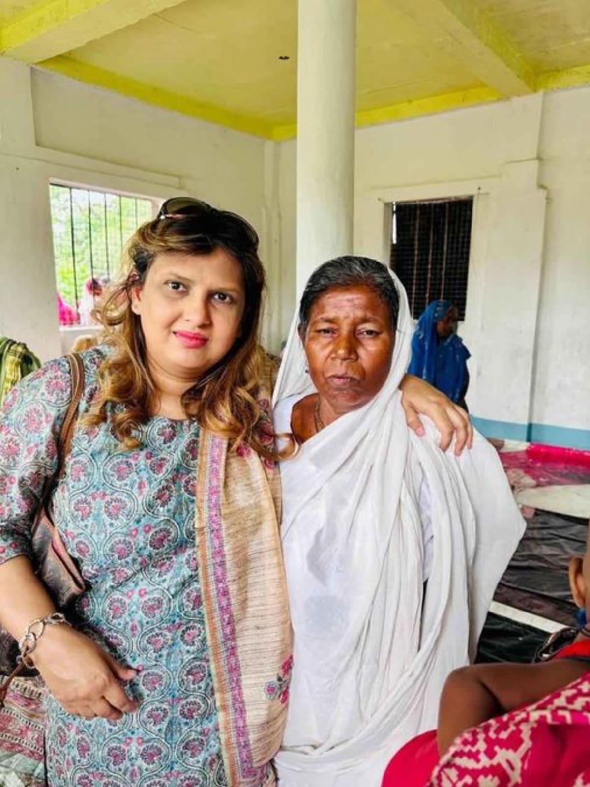 Women working together at fish farming ponds in the Sundarbans mangrove delta region