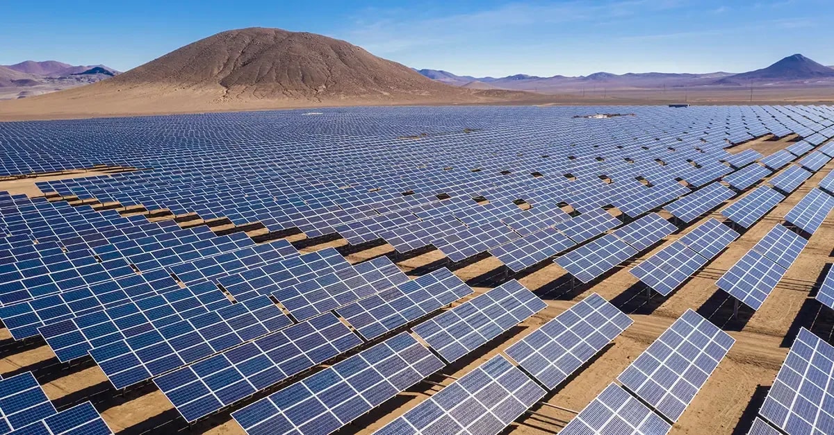 Solar panel arrays installed across desert landscape in Northern Chile's Gabriela renewable energy project