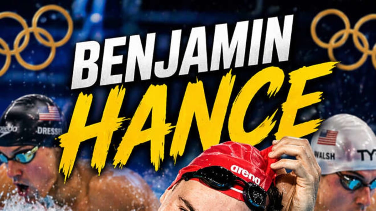 ** Paralympic wheelchair racer Benjamin Hance competing on athletics track in racing wheelchair