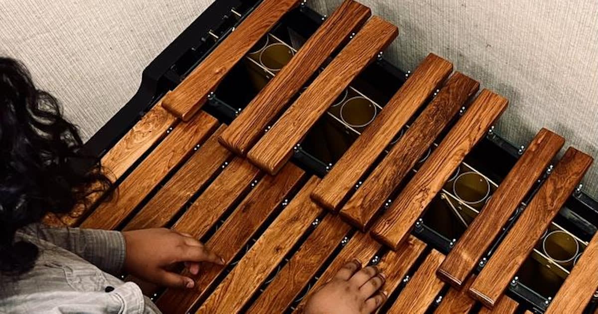 Marimba percussion instrument with wooden bars arranged in keyboard pattern