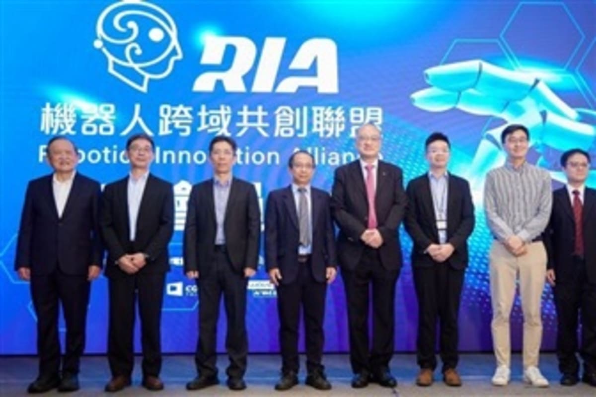 Robotic assistant helping elderly person in modern Taiwan healthcare facility with warm lighting