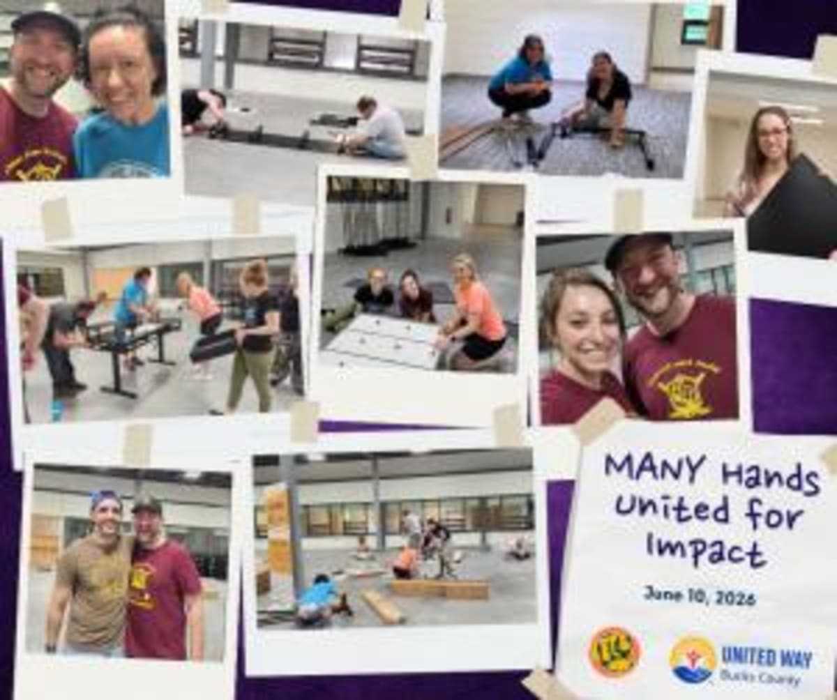 Volunteers assembling furniture and organizing equipment at United Way's new Levittown community service center