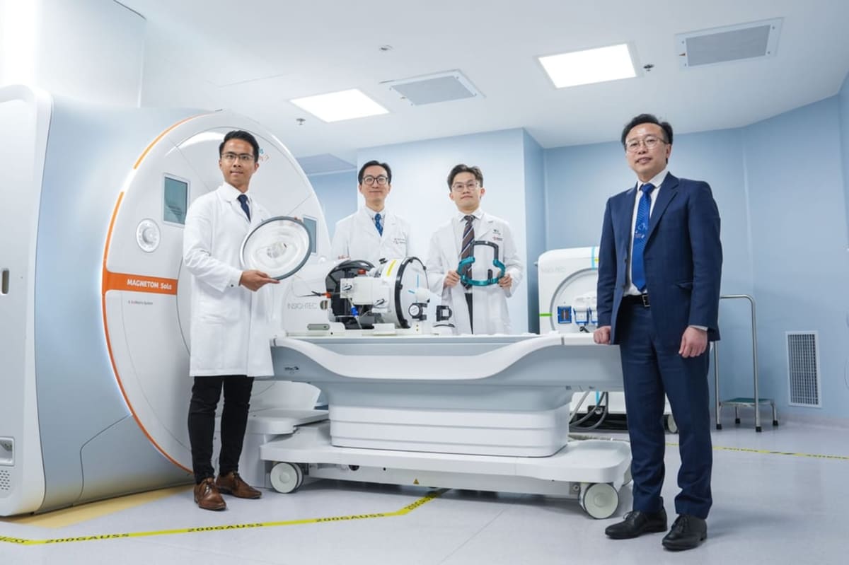 Medical team at Tuen Mun Hospital standing beside MRI-guided focused ultrasound system