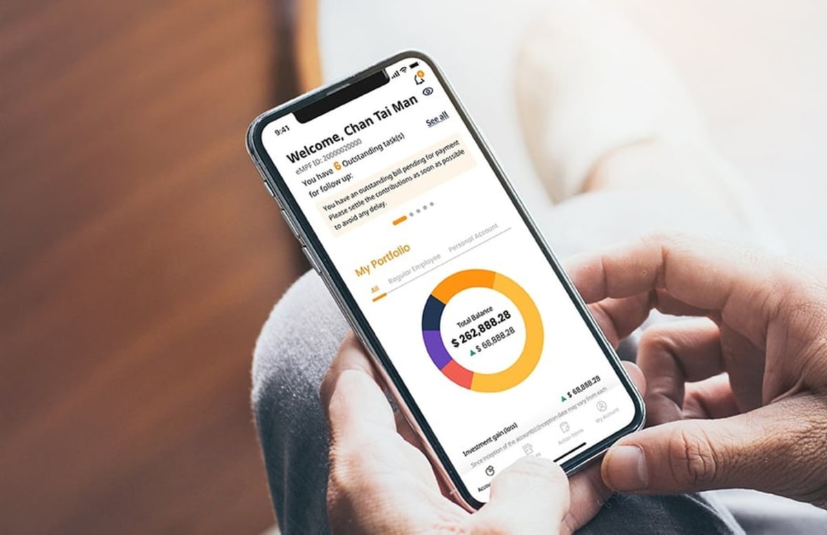 Digital tablet displaying Hong Kong's eMPF pension management platform with financial charts and retirement savings information