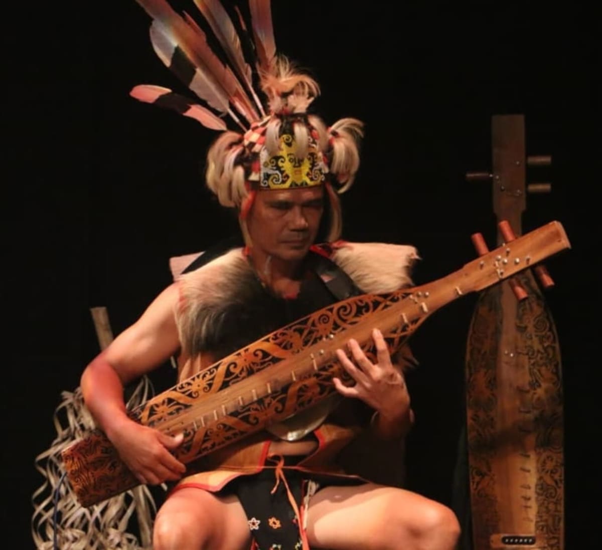 Young Malaysians Revive Ancient Sape Lute Tradition - Image 3