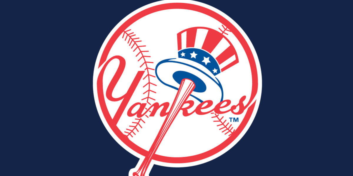 ** Yankee Stadium with American flag unfurled across outfield before 9/11 memorial ceremony