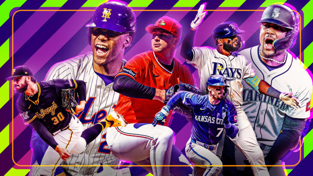 ** Baseball fan holding sleeping baby in one arm while catching foul ball with other hand