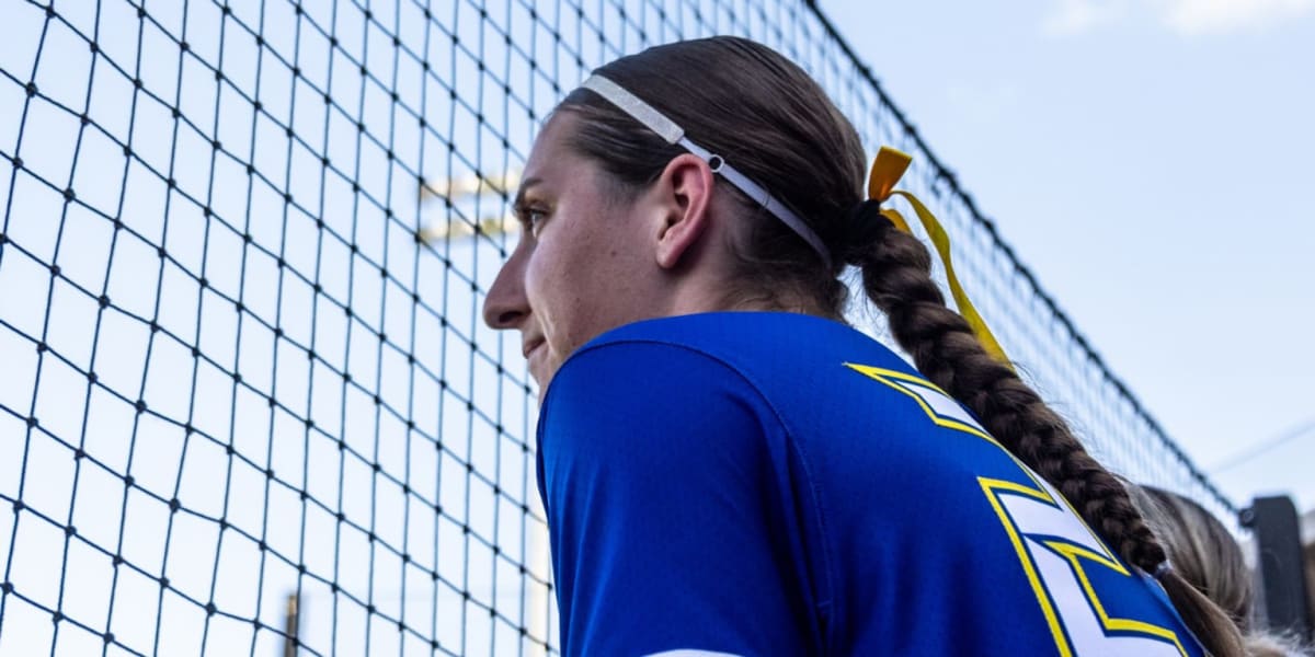 Maya Johnson pitching in her Oklahoma City Spark uniform during professional softball game
