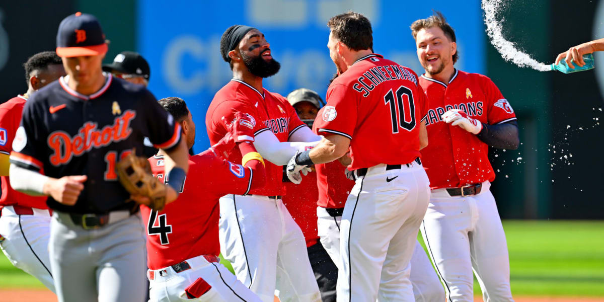 Cleveland Guardians Daniel Schneemann celebrates walk-off hit with teammates at Progressive Field