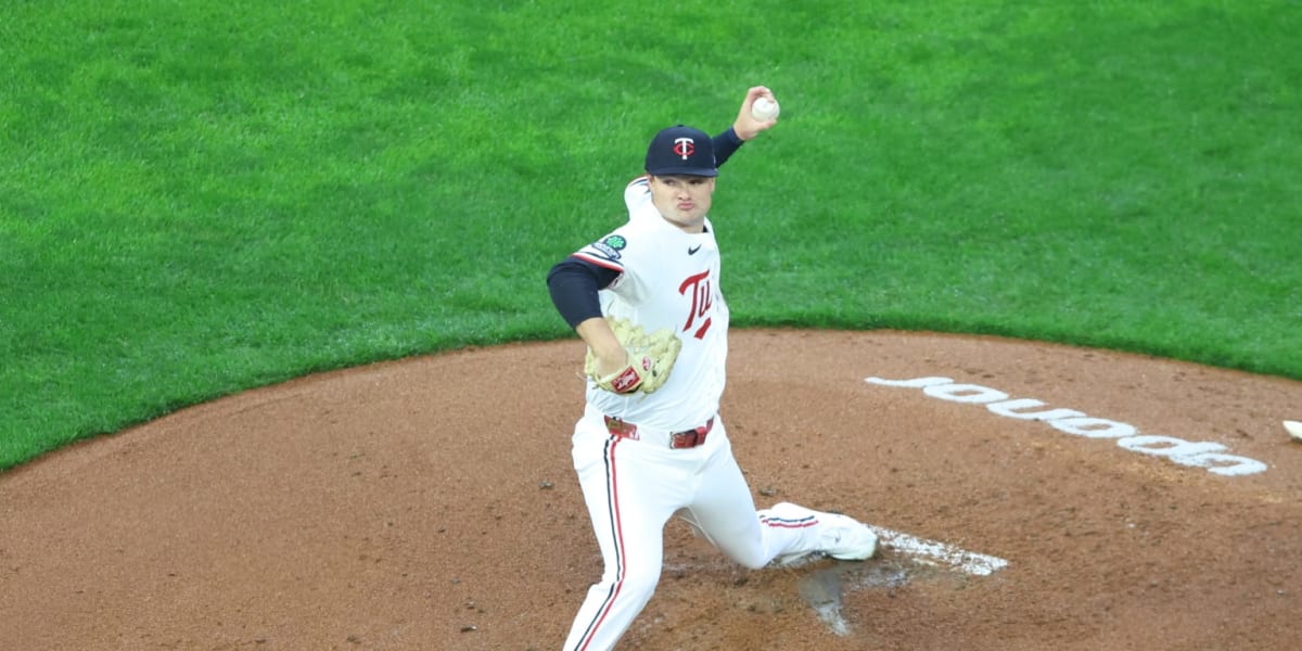 Minnesota Twins rookie pitcher Connor Prielipp celebrating his first Major League win with teammates