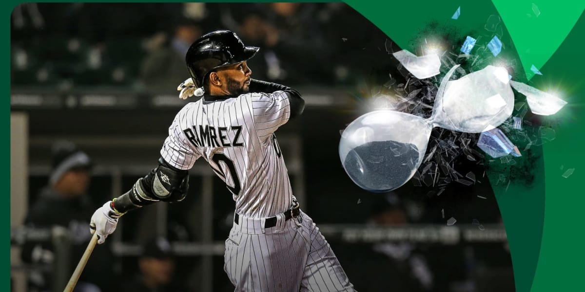 Alexei Ramirez in baseball uniform taking practice swings at Hiram Bithorn Stadium in Puerto Rico