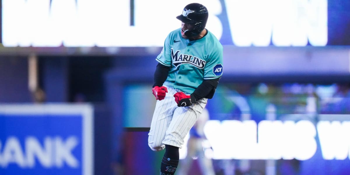 Miami Marlins player Heriberto Hernández celebrating after hitting walk-off grand slam at home plate