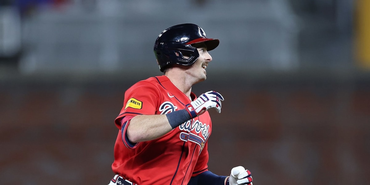 Mike Yastrzemski celebrates after hitting game-winning double for Atlanta Braves against Boston Red Sox