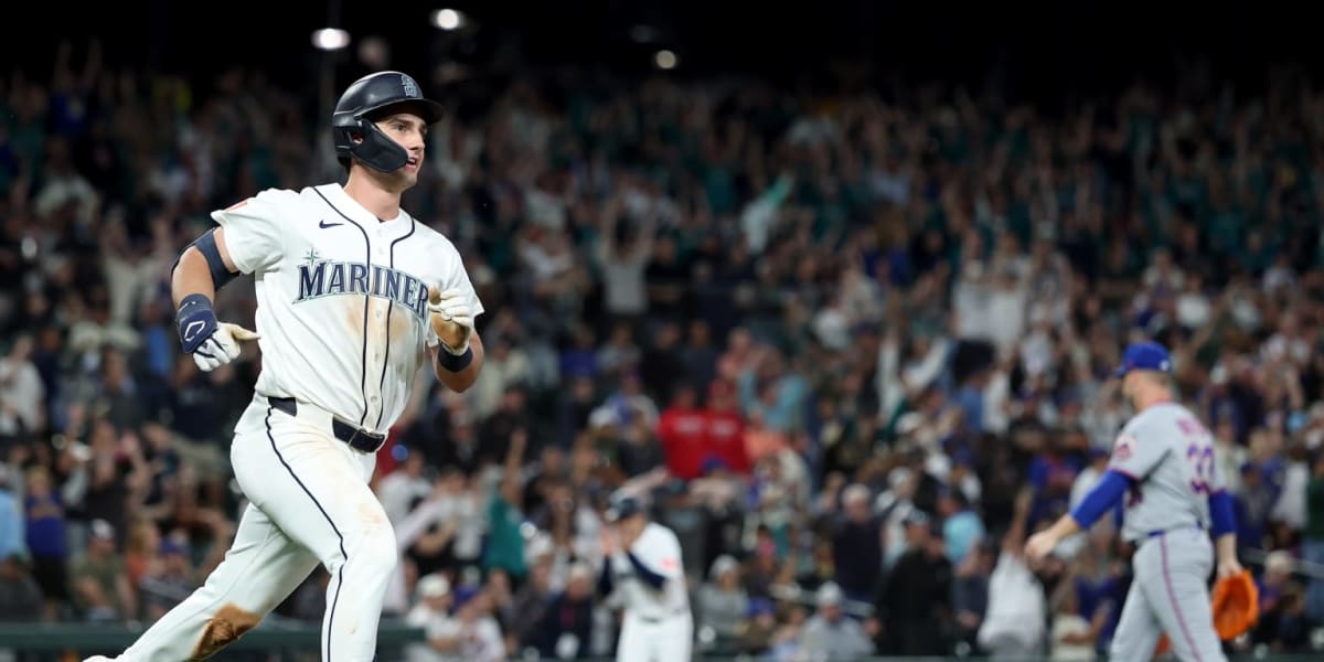 Seattle Mariners Cole Young celebrates after hitting game winning single in tenth inning