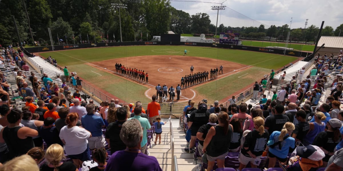 Young softball players celebrating on field during Little League Softball World Series game