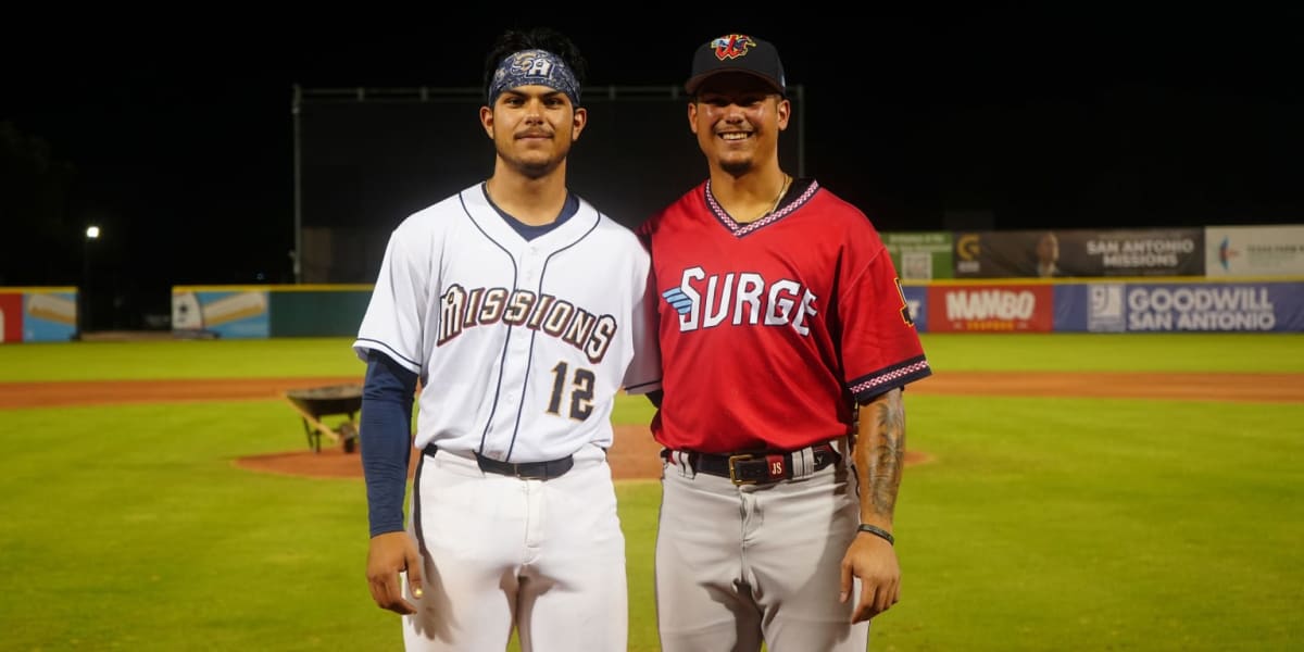 ** Two baseball players, brothers Ethan and Jose Salas, competing on opposing teams during minor league game