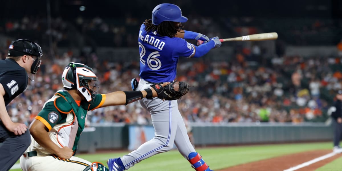 Charles McAdoo rounds bases after hitting two-run home run in MLB debut for Toronto Blue Jays