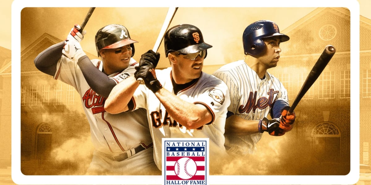 ** Three baseball players standing together at Hall of Fame induction ceremony in Cooperstown