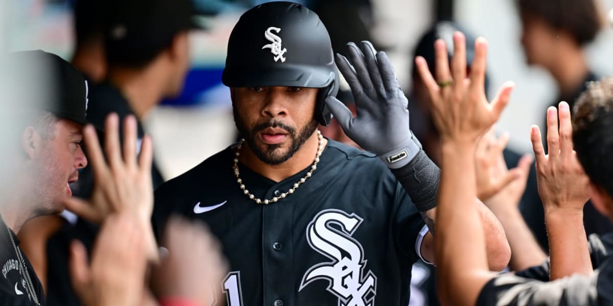 Tommy Pham swinging bat in White Sox uniform celebrating home run against Cleveland Guardians
