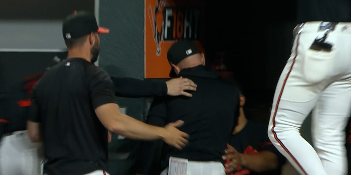 ** Baltimore Orioles manager Craig Albernaz standing in team dugout during baseball game