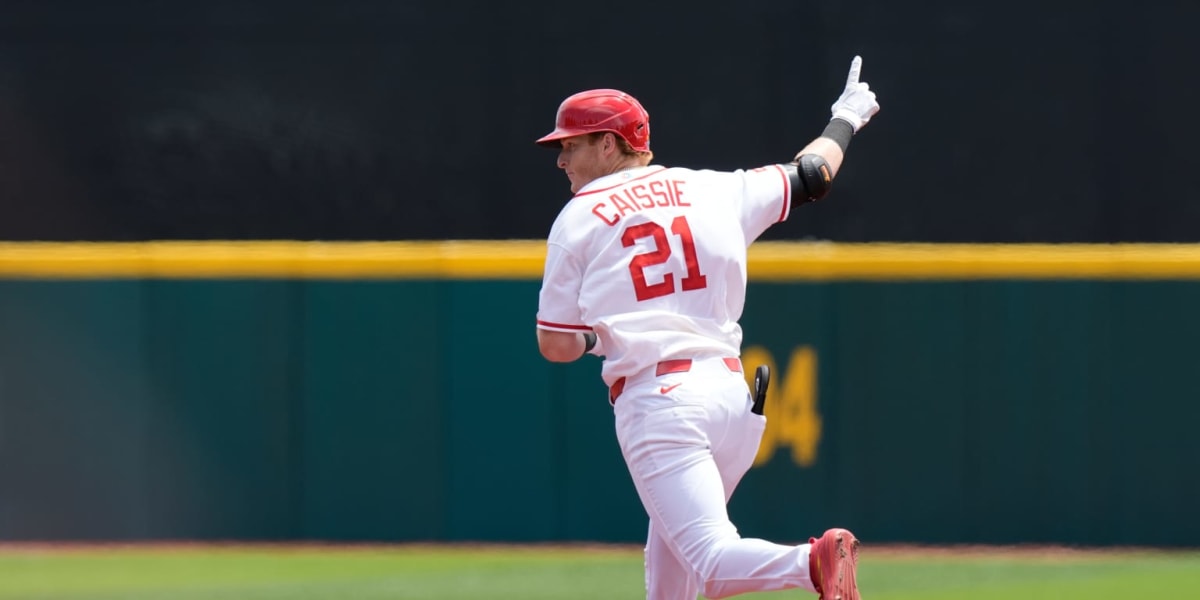 Canadian baseball players celebrating on field after World Baseball Classic victory in Puerto Rico