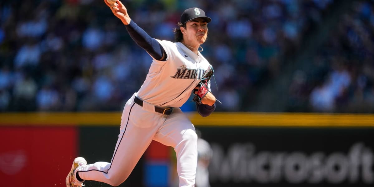 Seattle Mariners pitcher Bryan Woo on mound wearing colorful custom cleats painted by hospital patients