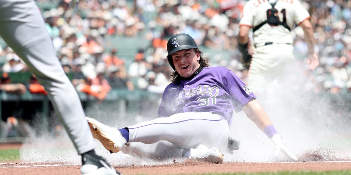 Baseball player Jake McCarthy racing around bases at Oracle Park during historic inside-the-park home run
