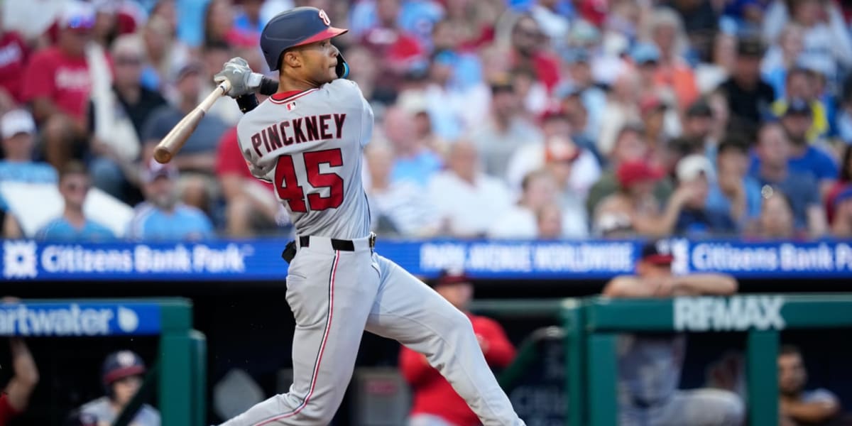 Baseball rookie Andrew Pinckney celebrates after hitting his first Major League home run