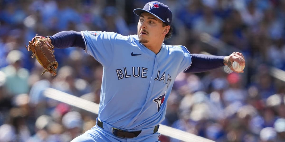 Ricky Tiedemann pitching in his Toronto Blue Jays uniform during his MLB debut game
