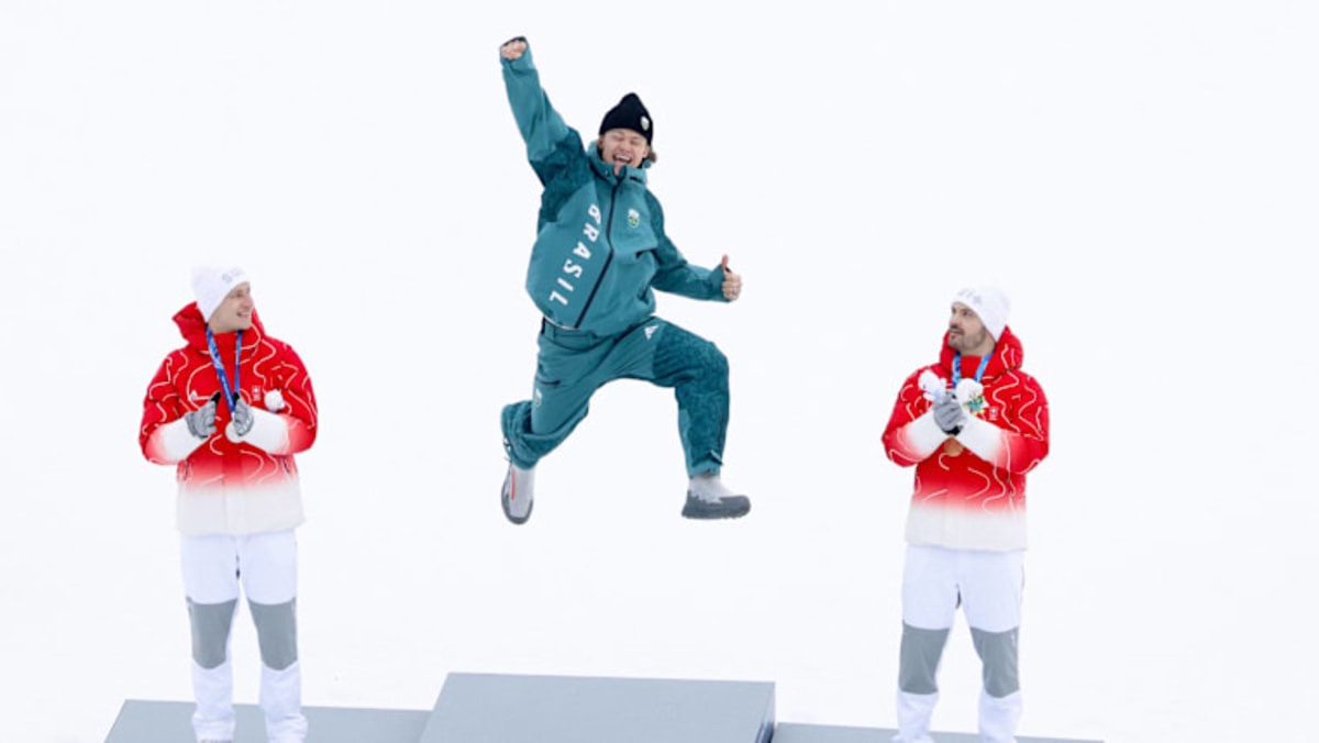 ** Brazilian skier Lucas Pinheiro Braathen celebrates winning historic giant slalom gold medal at Milano Cortina 2026