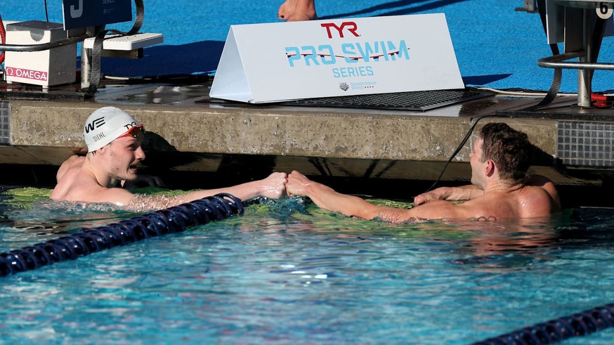 Ryan Murphy swimming backstroke in pool lane during Pro Swim Series competition