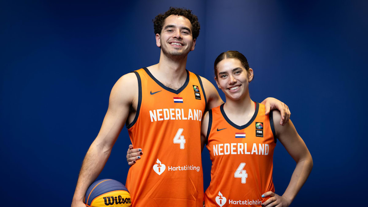 Dutch basketball siblings Jan and Noortje Driessen celebrating with their national team medals