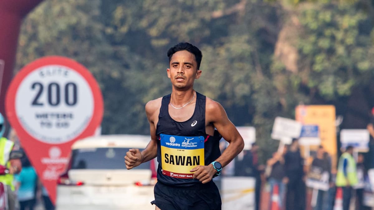Indian marathoner Sawan Barwal running in athletic gear during competition race