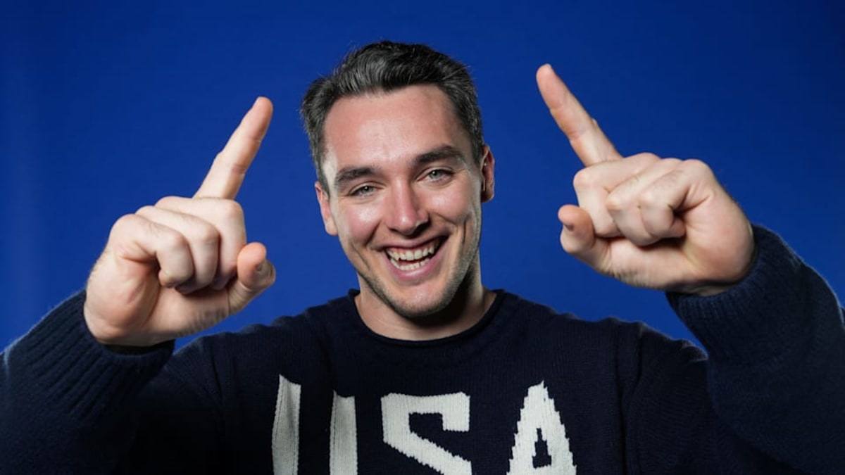 Jack Wallace competing in Para ice hockey wearing Team USA uniform on ice
