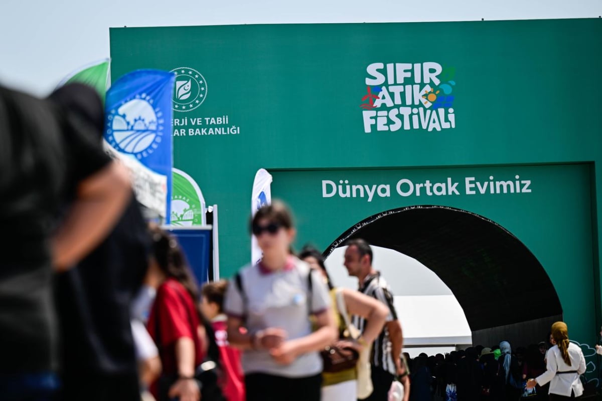 Children participate in hands-on recycling workshops creating art from waste materials at Istanbul festival