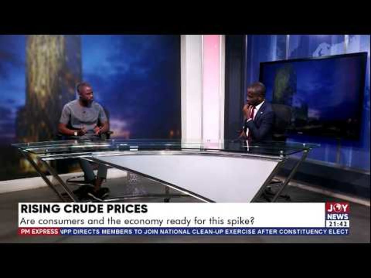 ** JoyNews studio broadcast desk with climate-focused television program branding