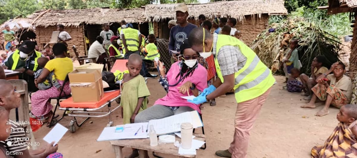 Dr. Alphonsine Colombe Irahali providing medical care during mobile clinic in Central African Republic forest village