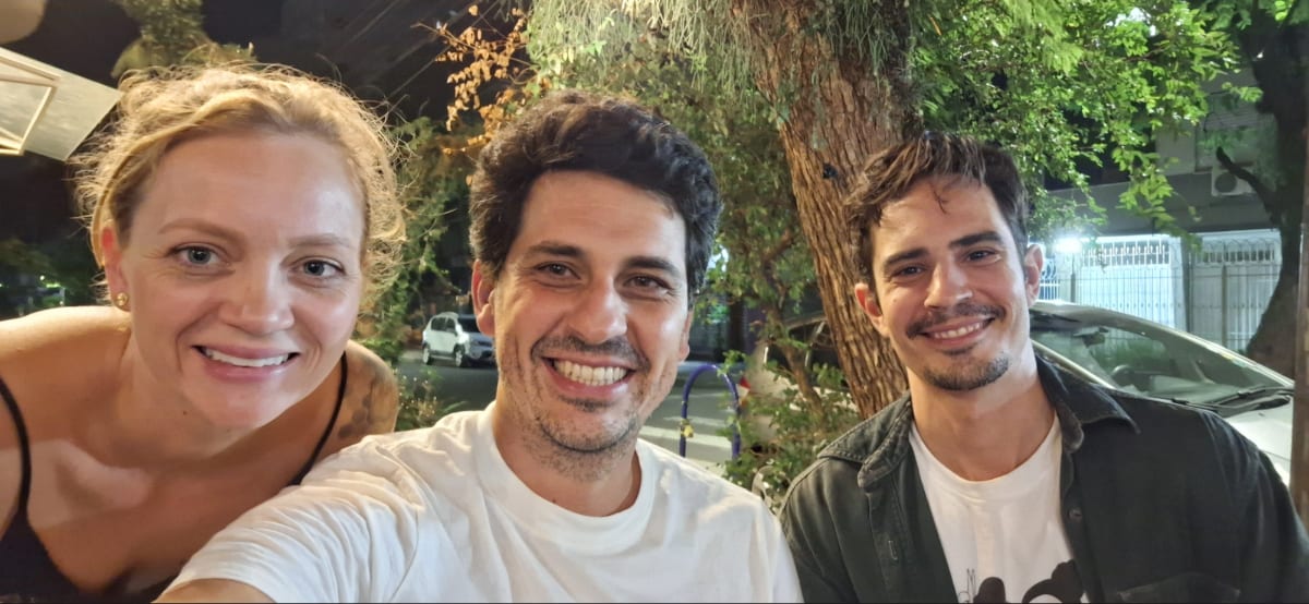 Alexandre de Santi holding a guitar, Brazilian environmental journalist and Mongabay editor