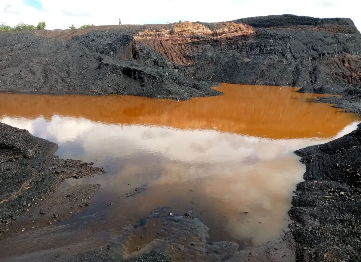 Government officials inspect contaminated mining waste site near rivers in northern Malawi