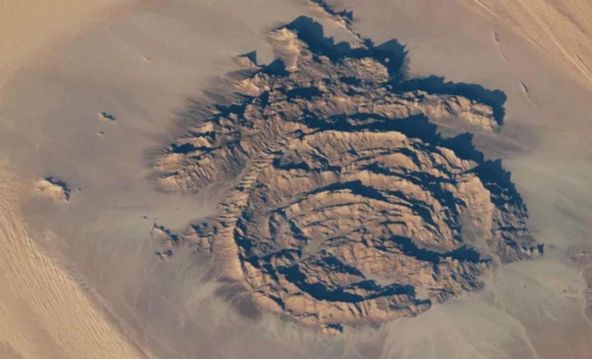 NASA Solves Mystery of Sahara's 15-Mile Ring Mountain