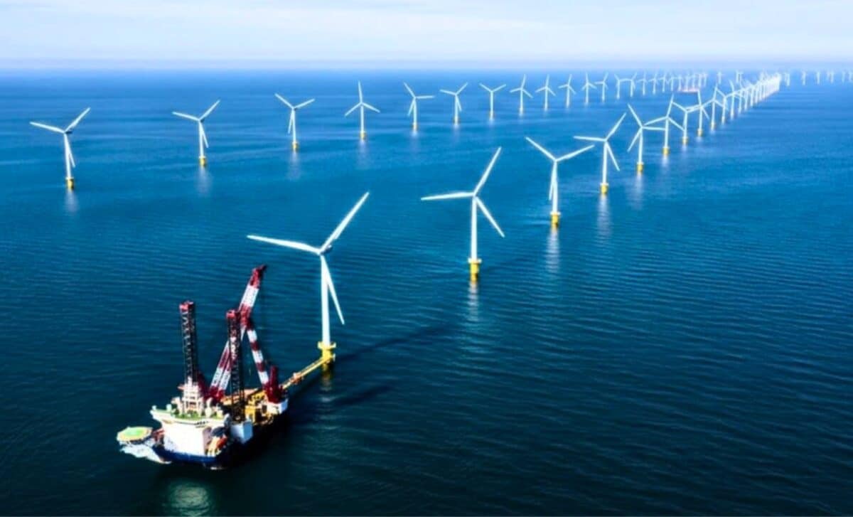 Massive offshore wind turbines standing in North Sea waters near Yorkshire coast