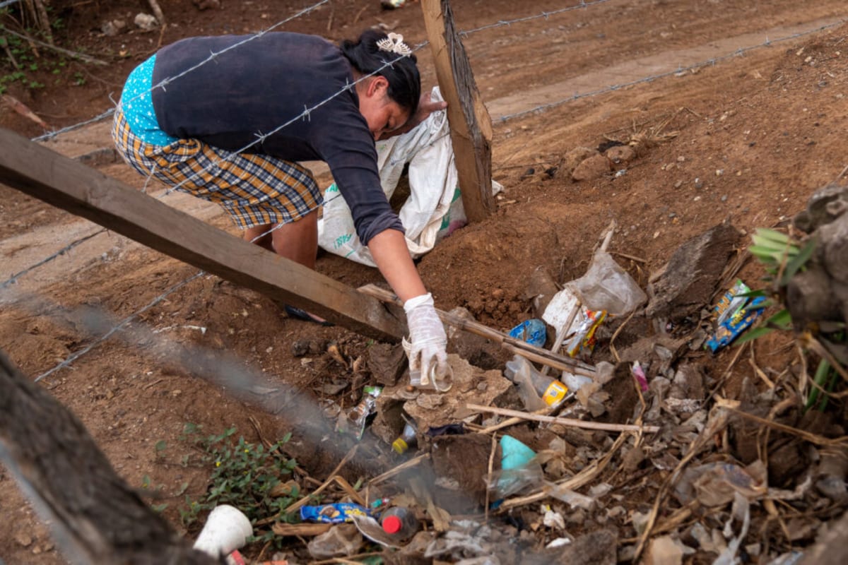** Soila Elizabeth Cruz, environmental health promoter, organizing plastic waste cleanup in Guatemalan mountains